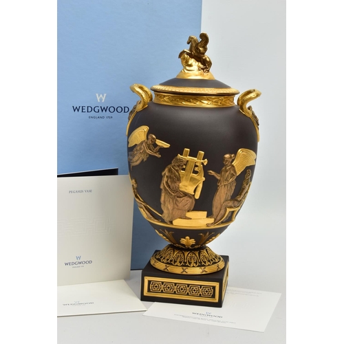 232 - A BOXED WEDGWOOD MASTERPIECE COLLECTION LIMITED EDITION BLACK BASALT AND GILT PEGASUS VASE AND COVER... 