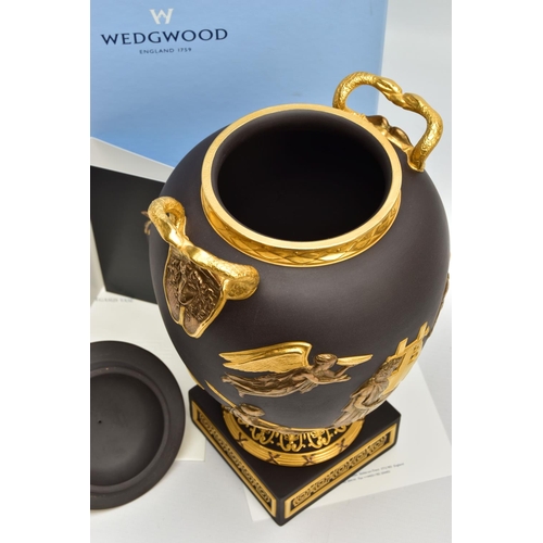 232 - A BOXED WEDGWOOD MASTERPIECE COLLECTION LIMITED EDITION BLACK BASALT AND GILT PEGASUS VASE AND COVER... 