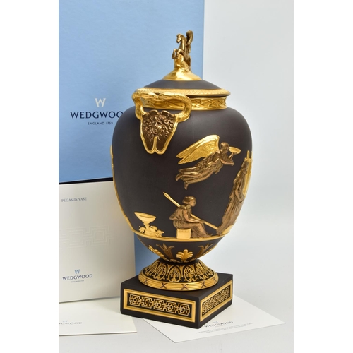 232 - A BOXED WEDGWOOD MASTERPIECE COLLECTION LIMITED EDITION BLACK BASALT AND GILT PEGASUS VASE AND COVER... 