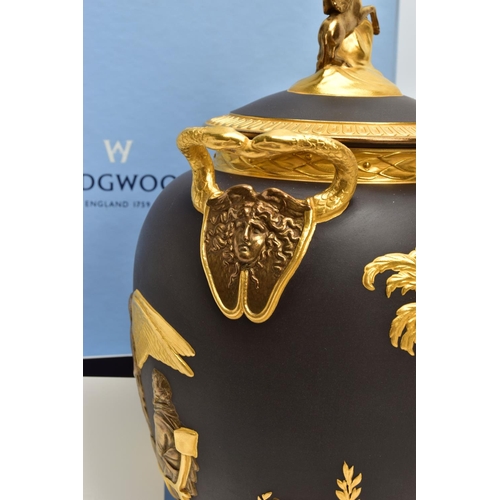 232 - A BOXED WEDGWOOD MASTERPIECE COLLECTION LIMITED EDITION BLACK BASALT AND GILT PEGASUS VASE AND COVER... 