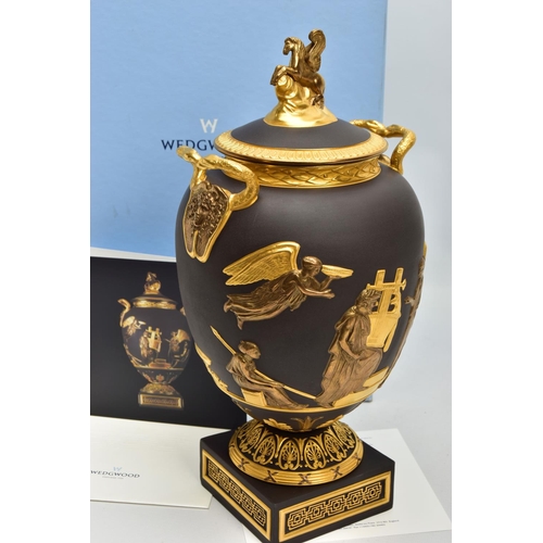 232 - A BOXED WEDGWOOD MASTERPIECE COLLECTION LIMITED EDITION BLACK BASALT AND GILT PEGASUS VASE AND COVER... 