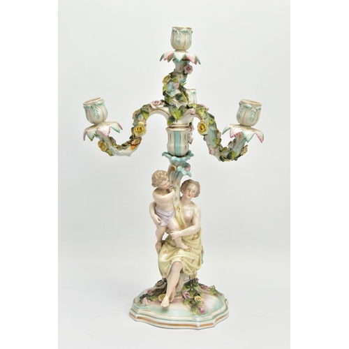 235 - A PAIR OF LATE 19TH / EARLY 20TH CENTURY PLAUE PORCELAIN FLORALLY ENCRUSTED FIGURAL CANDELABRA, each... 