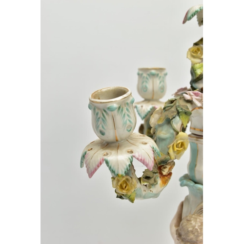 235 - A PAIR OF LATE 19TH / EARLY 20TH CENTURY PLAUE PORCELAIN FLORALLY ENCRUSTED FIGURAL CANDELABRA, each... 