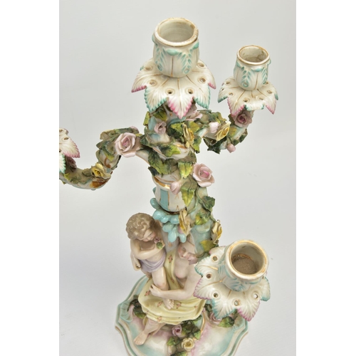 235 - A PAIR OF LATE 19TH / EARLY 20TH CENTURY PLAUE PORCELAIN FLORALLY ENCRUSTED FIGURAL CANDELABRA, each... 