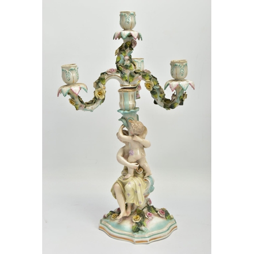 235 - A PAIR OF LATE 19TH / EARLY 20TH CENTURY PLAUE PORCELAIN FLORALLY ENCRUSTED FIGURAL CANDELABRA, each... 