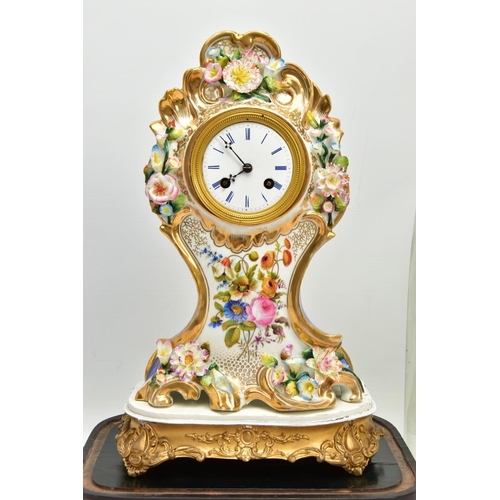 237 - A LATE 19TH CENTURY FRENCH PORCELAIN CASED MANTEL CLOCK OF ROCOCO STYLE, enamel dial with blue Roman... 