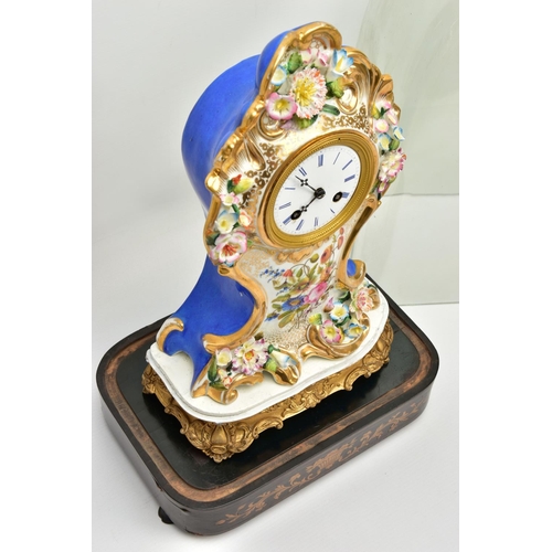 237 - A LATE 19TH CENTURY FRENCH PORCELAIN CASED MANTEL CLOCK OF ROCOCO STYLE, enamel dial with blue Roman... 