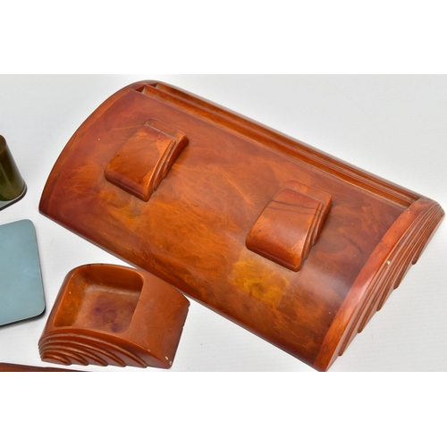 242 - THREE PIECES OF ART DECO CARVACRAFT DESK ACCESSORIES IN AMBER BAKELITE, comprising a desk stand fitt... 