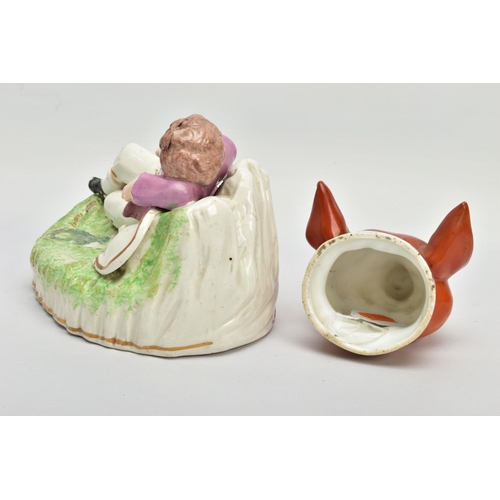 244 - AN EARLY 19TH CENTURY ENGLISH PORCELAIN FOX HEAD STIRRUP CUP, with gilt collar inscribed 'Tally ho',... 