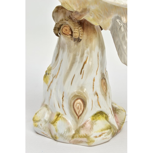 245 - A 20TH CENTURY MEISSEN COCKATOO AFTER J.J. KANDLER, modelled as perched on a mossy covered stump wit... 