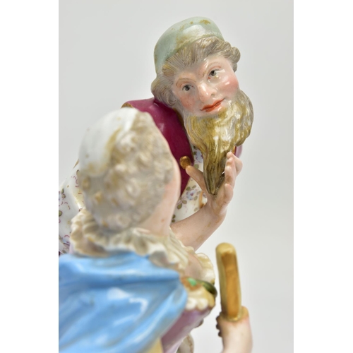 246 - A LATE 19TH CENTURY MEISSEN FIGURE GROUP OF PANTALONE AND COLUMBINE, modelled as seated and standing... 