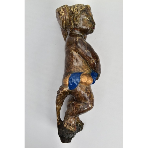 249 - A CARVED WOODEN SUPPORT IN THE FORM OF A PUTTI, with later polychrome decoration and later ebonised ... 