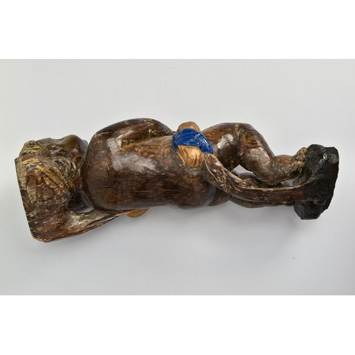 249 - A CARVED WOODEN SUPPORT IN THE FORM OF A PUTTI, with later polychrome decoration and later ebonised ... 