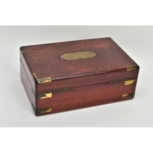 255 - AN EARLY 19TH CENTURY MAHOGANY AND GILT BRASS BANDED GENTLEMAN'S DRESSING BOX OF RECTANGULAR FORM, t... 