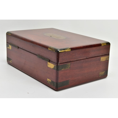 255 - AN EARLY 19TH CENTURY MAHOGANY AND GILT BRASS BANDED GENTLEMAN'S DRESSING BOX OF RECTANGULAR FORM, t... 