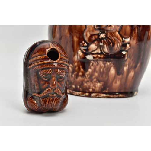 265 - A VICTORIAN JOSEPH THOMPSON HARTSHORNE POTTERY TREACLE GLAZED MASK INKWELL / PEN REST, modelled as a... 