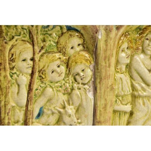 268 - A DELLA ROBBIA THREE SECTION RECTANGULAR PLAQUE MOULDED IN RELIEF WITH A PROCESSION OF CHILDREN THRO... 