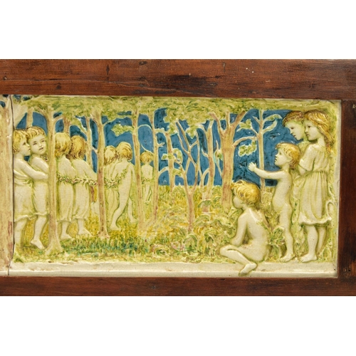 268 - A DELLA ROBBIA THREE SECTION RECTANGULAR PLAQUE MOULDED IN RELIEF WITH A PROCESSION OF CHILDREN THRO... 