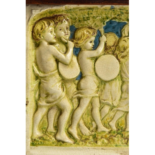 268 - A DELLA ROBBIA THREE SECTION RECTANGULAR PLAQUE MOULDED IN RELIEF WITH A PROCESSION OF CHILDREN THRO... 