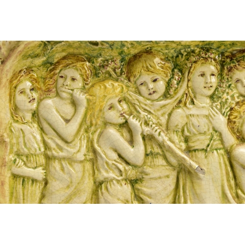 268 - A DELLA ROBBIA THREE SECTION RECTANGULAR PLAQUE MOULDED IN RELIEF WITH A PROCESSION OF CHILDREN THRO... 