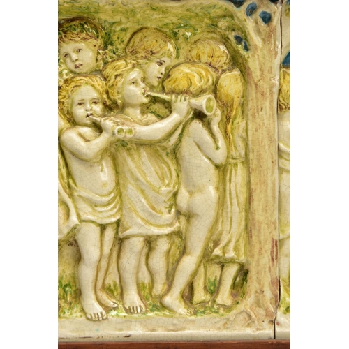 268 - A DELLA ROBBIA THREE SECTION RECTANGULAR PLAQUE MOULDED IN RELIEF WITH A PROCESSION OF CHILDREN THRO... 