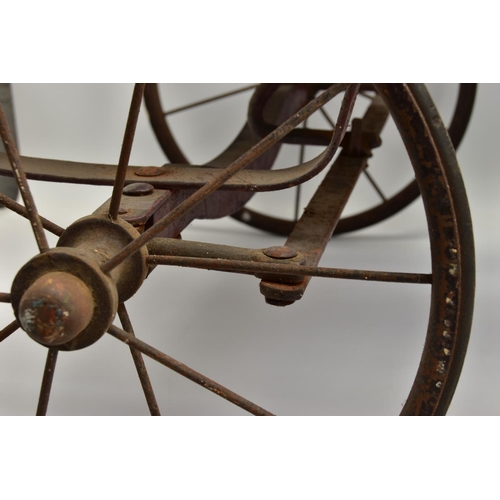 269 - A WOODEN BODIED PEDAL CAR, early 20th Century, open body in the style of a Edwardian saloon with cur... 