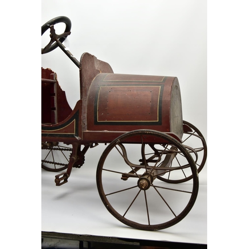 269 - A WOODEN BODIED PEDAL CAR, early 20th Century, open body in the style of a Edwardian saloon with cur... 