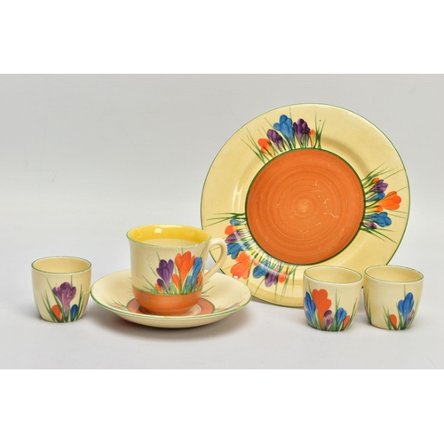 272 - SIX PIECES OF CLARICE CLIFF AUTUMN CROCUS PATTERN ITEMS, comprising three egg cups with Bizarre back... 