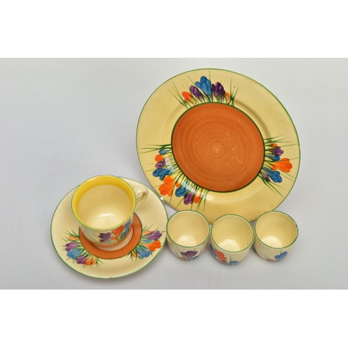 272 - SIX PIECES OF CLARICE CLIFF AUTUMN CROCUS PATTERN ITEMS, comprising three egg cups with Bizarre back... 