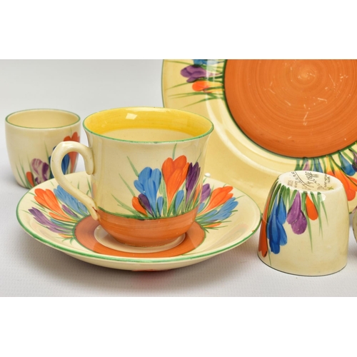 272 - SIX PIECES OF CLARICE CLIFF AUTUMN CROCUS PATTERN ITEMS, comprising three egg cups with Bizarre back... 