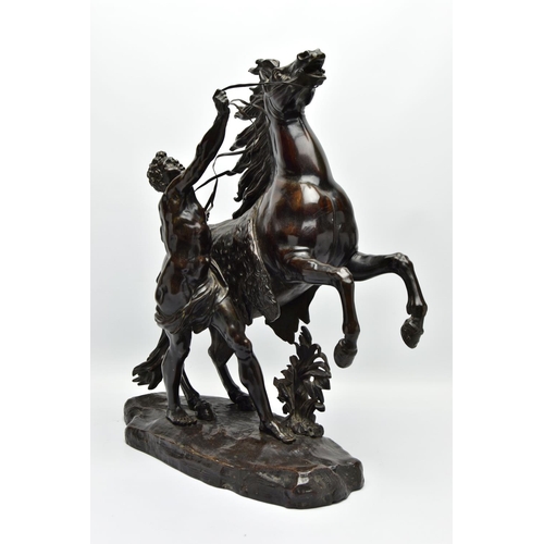 279 - AFTER GUILLAME COUSTEAU, A 19TH CENTURY PAIR OF PATINATED BRONZE MARLY HORSES, with attendants, on n... 