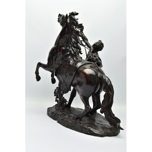 279 - AFTER GUILLAME COUSTEAU, A 19TH CENTURY PAIR OF PATINATED BRONZE MARLY HORSES, with attendants, on n... 