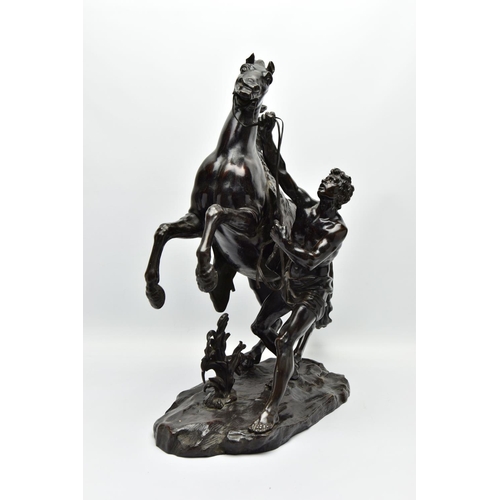 279 - AFTER GUILLAME COUSTEAU, A 19TH CENTURY PAIR OF PATINATED BRONZE MARLY HORSES, with attendants, on n... 