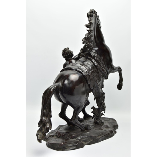 279 - AFTER GUILLAME COUSTEAU, A 19TH CENTURY PAIR OF PATINATED BRONZE MARLY HORSES, with attendants, on n... 