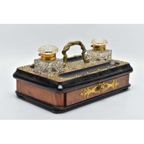 286 - A VICTORIAN WALNUT, EBONISED AND BRASS MOUNTED DESK STAND OF RECTANGULAR FORM, with entwined snake c... 