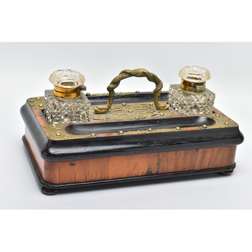 286 - A VICTORIAN WALNUT, EBONISED AND BRASS MOUNTED DESK STAND OF RECTANGULAR FORM, with entwined snake c... 