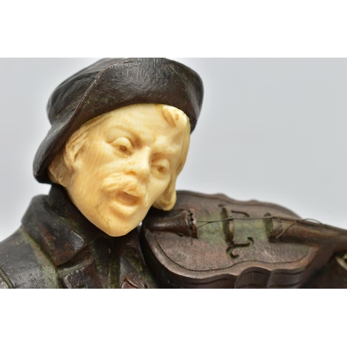 294 - DOMINIQUE ALONZO (FL. 1910-1930) A PATINATED BRONZE AND IVORY FIGURE OF A MALE VIOLINIST, posed stan... 