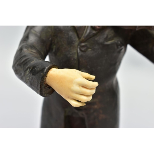 294 - DOMINIQUE ALONZO (FL. 1910-1930) A PATINATED BRONZE AND IVORY FIGURE OF A MALE VIOLINIST, posed stan... 