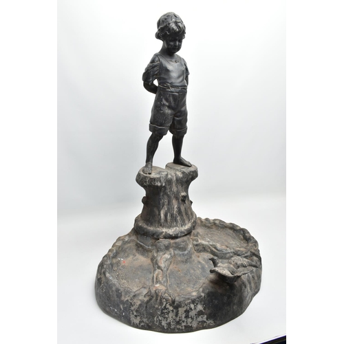 315 - AN EARLY 20TH CENTURY HOLLOW CAST LEAD FIGURAL BIRD BATH, modelled as a boy standing on a tree trunk... 