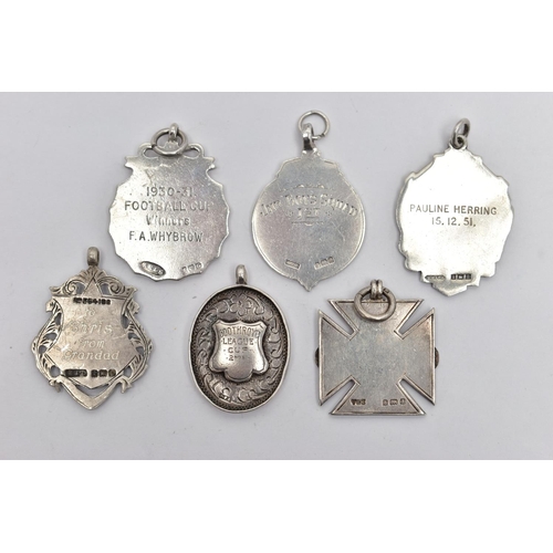 102 - SIX PREDOMINANTLY SILVER FOB MEDALLIONS, to include a late 19th century silver medallion, hallmarked... 