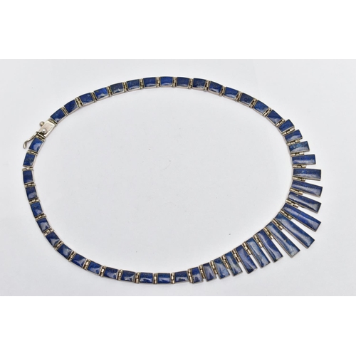 107 - A WHITE METAL LAPIS LAZULI FRINGE NECKLACE, designed as a series of graduated lapis lazuli hinged pa... 