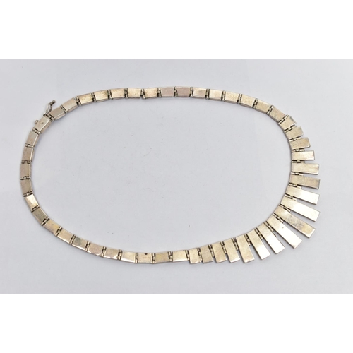 107 - A WHITE METAL LAPIS LAZULI FRINGE NECKLACE, designed as a series of graduated lapis lazuli hinged pa... 