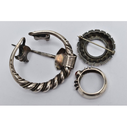 115 - A CLOAK CLIP, BROOCH AND A RING, the white metal cloak clip of a circular form, featuring rope twist... 