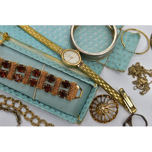 116 - A BAG OF ASSORTED ITEMS, to include a yellow metal paste set bracelet, two ladies gold plated wristw... 