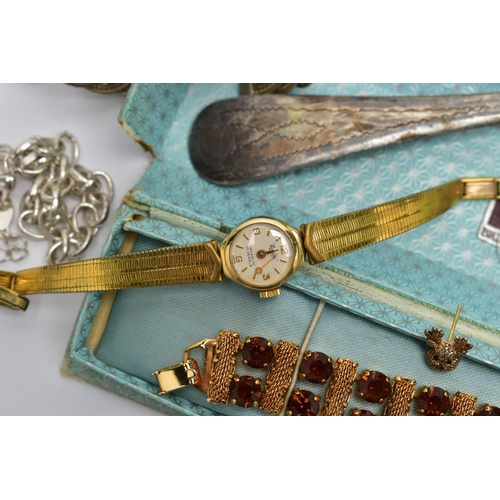 116 - A BAG OF ASSORTED ITEMS, to include a yellow metal paste set bracelet, two ladies gold plated wristw... 