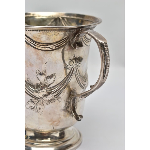 119 - A GEORGE III SILVER LOVING CUP, bell shape body with embossed and chased floral and swag design with... 