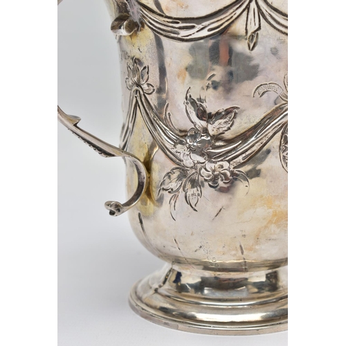 119 - A GEORGE III SILVER LOVING CUP, bell shape body with embossed and chased floral and swag design with... 