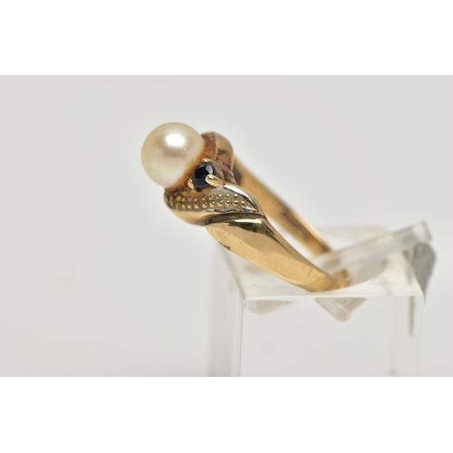 16 - A 9CT GOLD CULTURED PEARL AND SAPPHIRE DRESS RING, the cultured pearl, with asymmetric set circular ... 