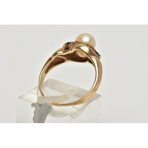 16 - A 9CT GOLD CULTURED PEARL AND SAPPHIRE DRESS RING, the cultured pearl, with asymmetric set circular ... 