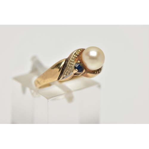 16 - A 9CT GOLD CULTURED PEARL AND SAPPHIRE DRESS RING, the cultured pearl, with asymmetric set circular ... 